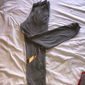 Grey Nike Sweats with Gold Swoosh